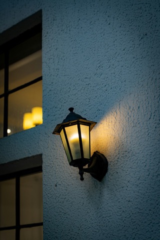 An outdoor lamp on the wall
